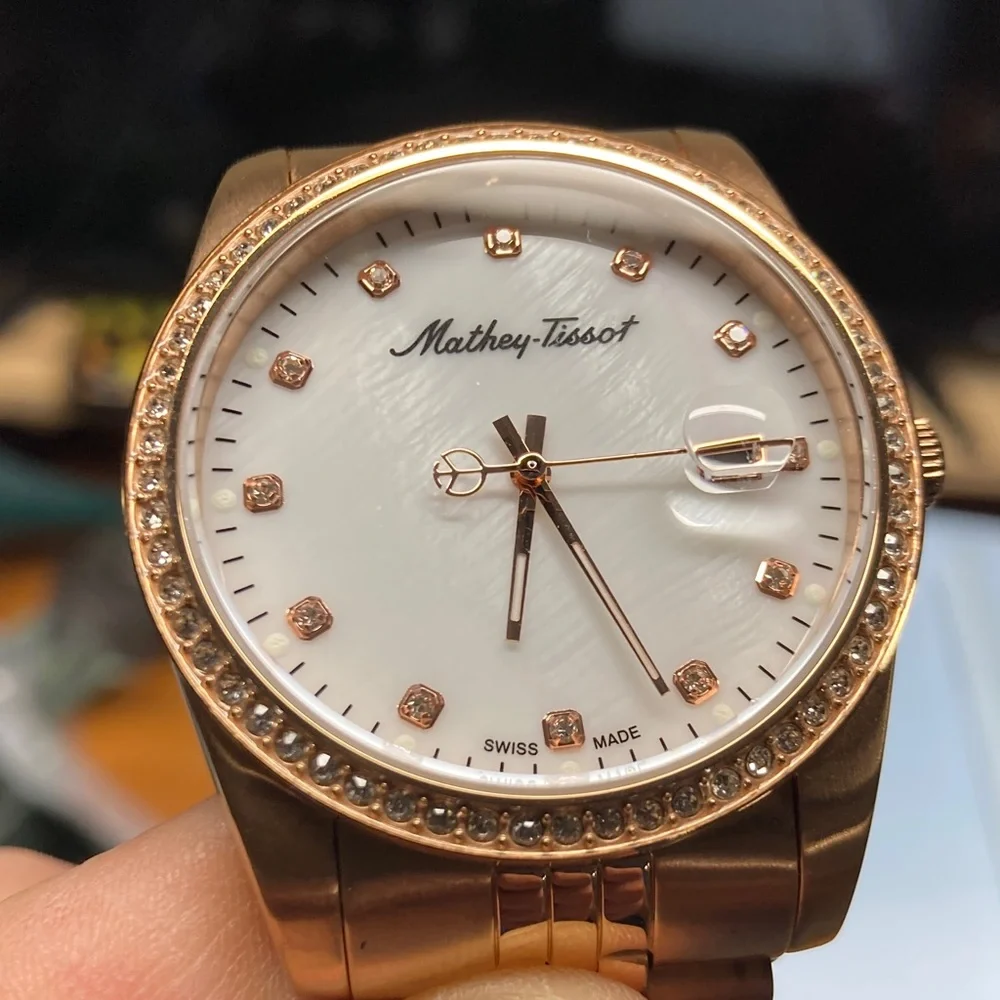 Mathey Tissot H709 rose gold tone, white textured dial, new battery, stainless